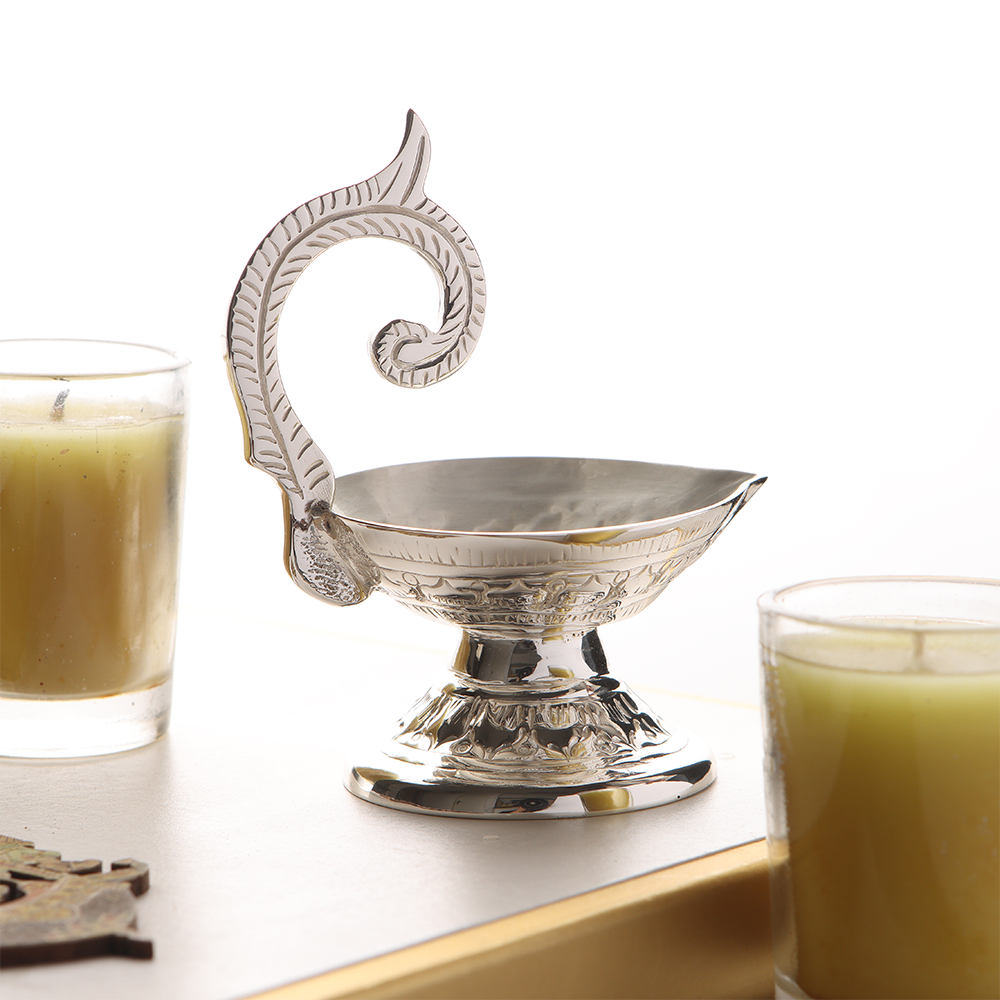 Elegant Silver-Plated Diya with Ornate Curved Handle