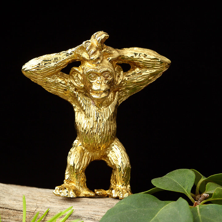 CHIMPANZEE CUB FIGURINE
